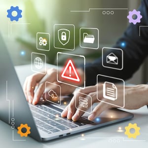 Hands typing on a laptop with icons of gears, file folders, and a warning.